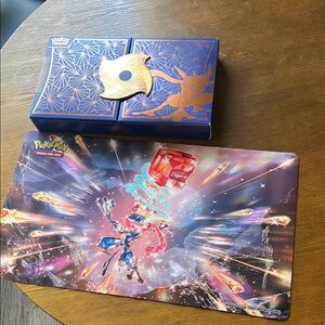 Blue and Gold Pokemon Trading Card Boxes and Playmat